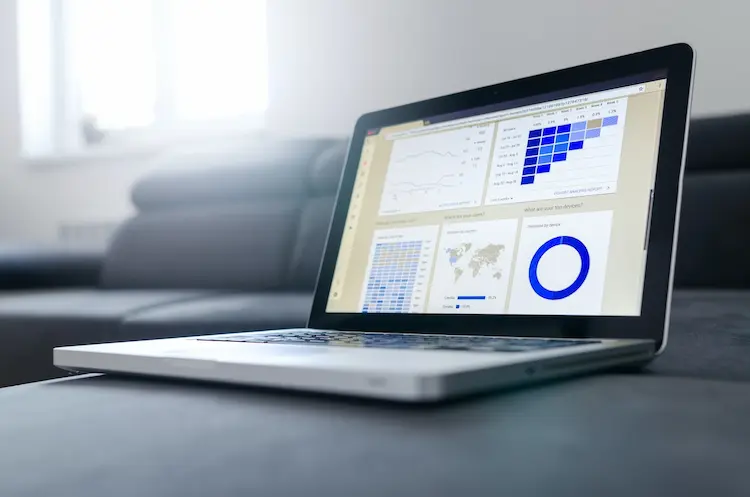 laptop displaying a data analytics dashboard