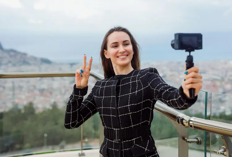 blogger-girl-showing-camera-her-hand